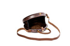 Round wooden bag in dark plum — angle view