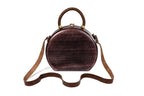 Round wooden handbag in dark plum, 9.1" / 23 cm — full view