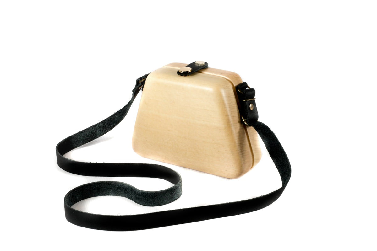 Trapezoid wooden bag in natural wood — angle view