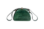 Trapezoid wooden handbag in forest green — detail view