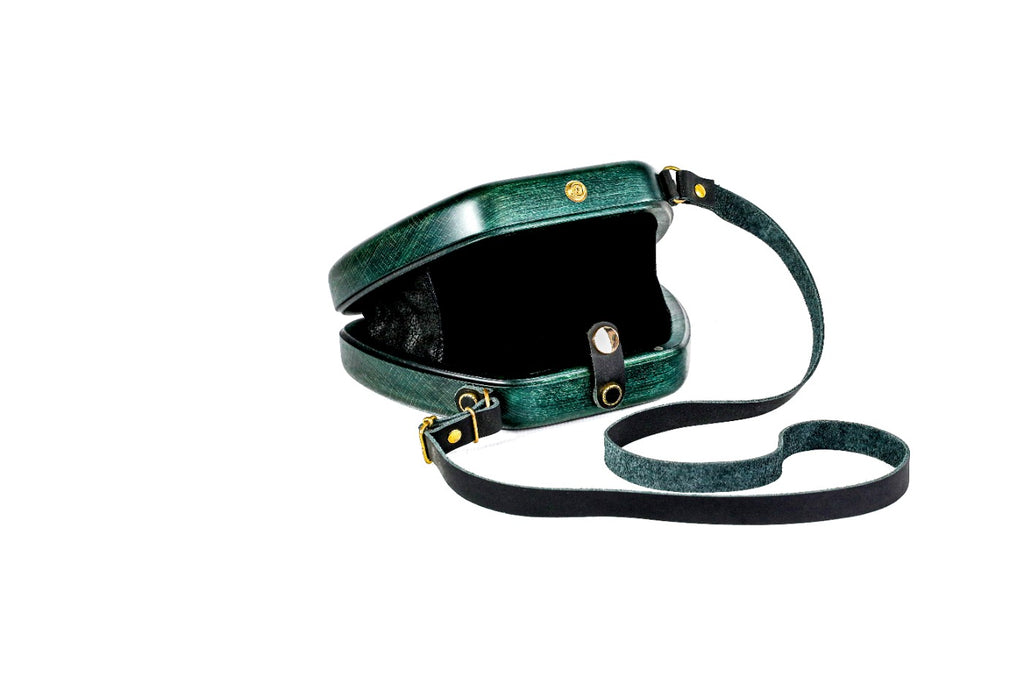 Forest green wooden bag with leather strap — side view