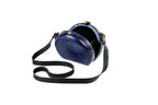 Round wooden bag in navy blue — angle view