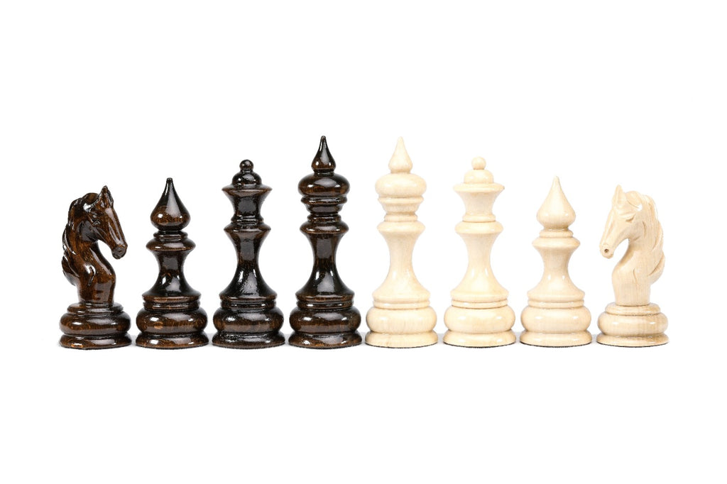 Knight, bishop, queen and king in walnut next to the same four pieces in beech