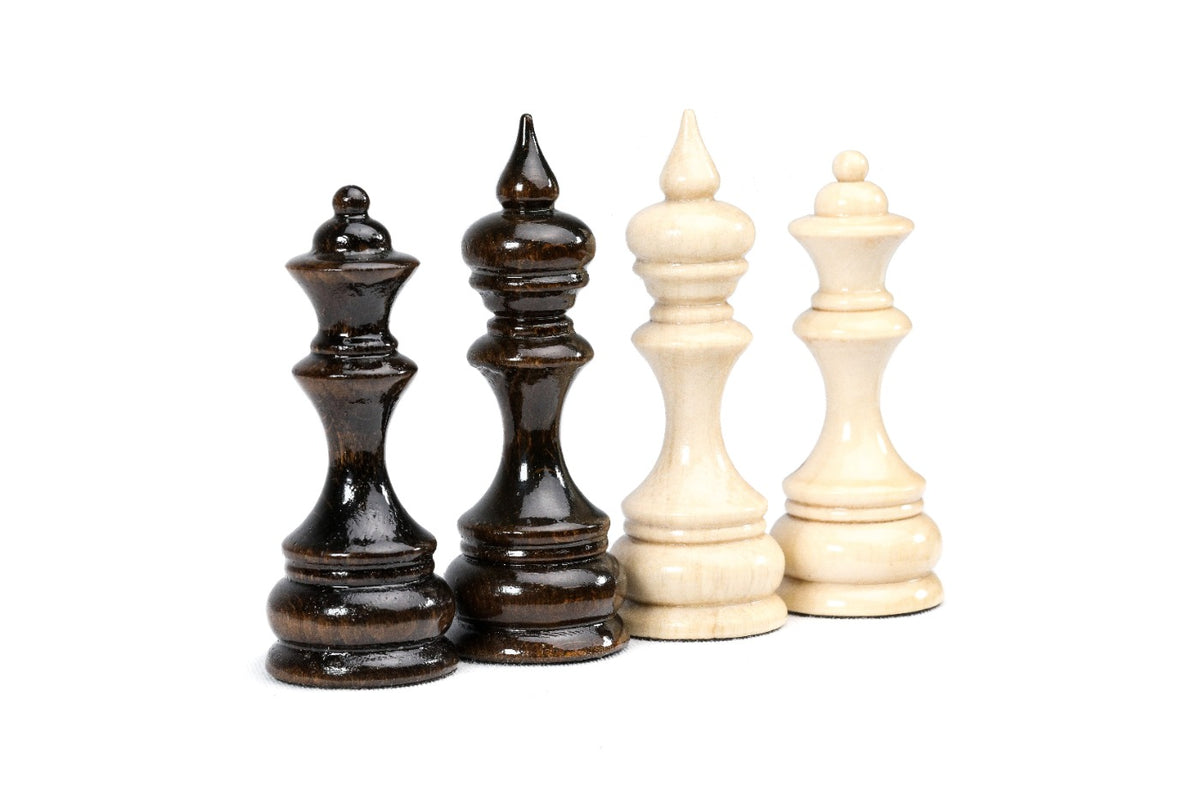 Walnut queen and king with the beech king and queen, the spire-topped kings of the classic set
