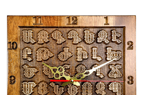 Hand-carved Armenian alphabet wall clock, second view, by Hrachya Ohanyan
