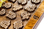 Hand-carved Armenian alphabet wall clock, view 8, by Hrachya Ohanyan