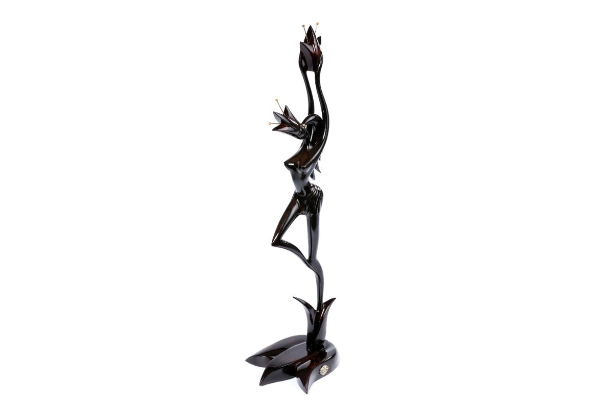 Handmade wooden figurative sculpture of a girl with flower — carving detail