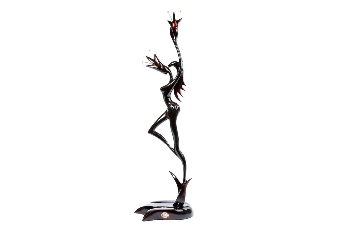 Hand-carved Girl with Flower figure sculpture — back view