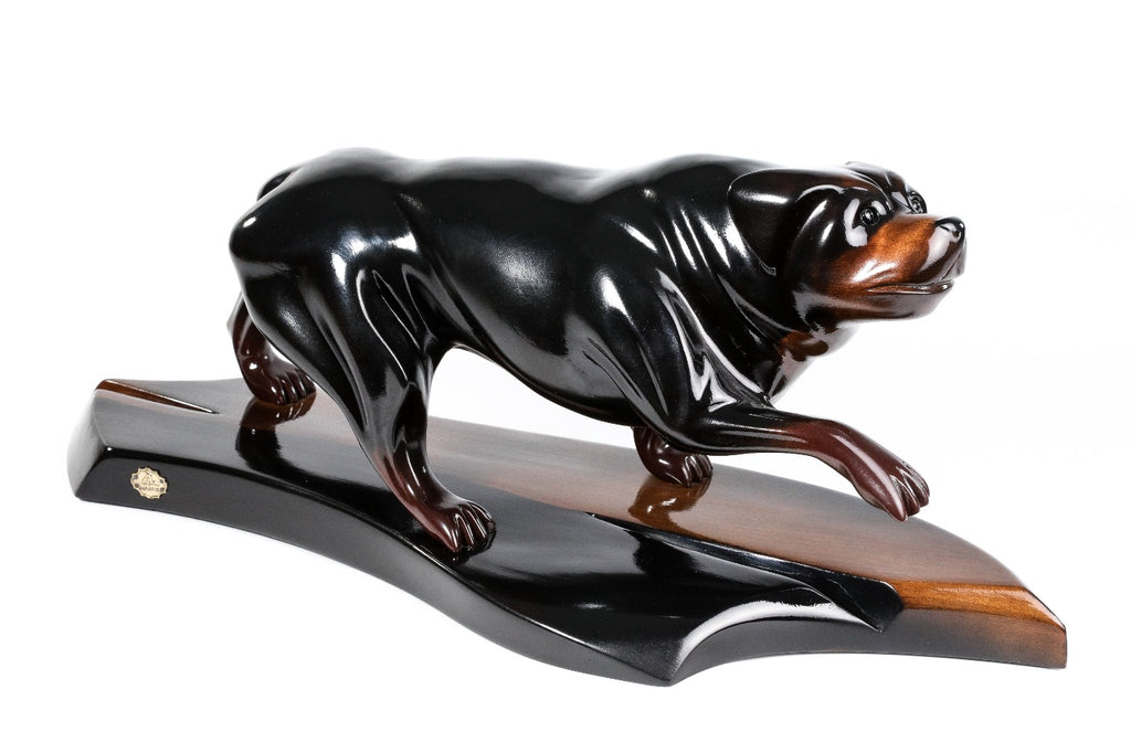 Hand-carved Rottweiler sculpture — profile view