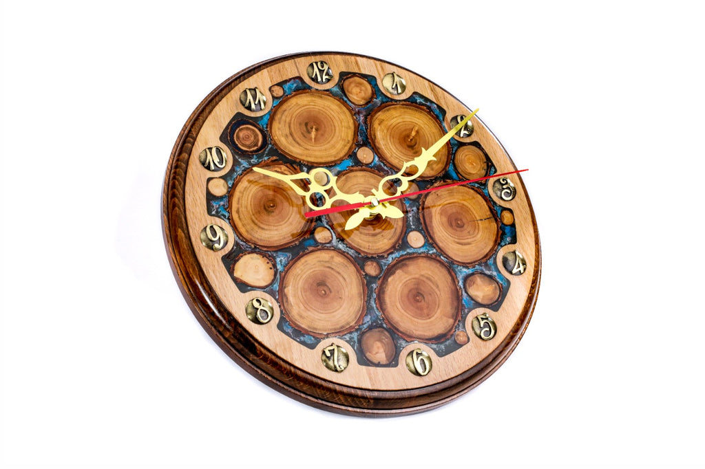 Tree branches and blue epoxy wall clock, detail view, by Hrachya Ohanyan