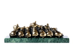 Bronze piglets sculpture — detail view