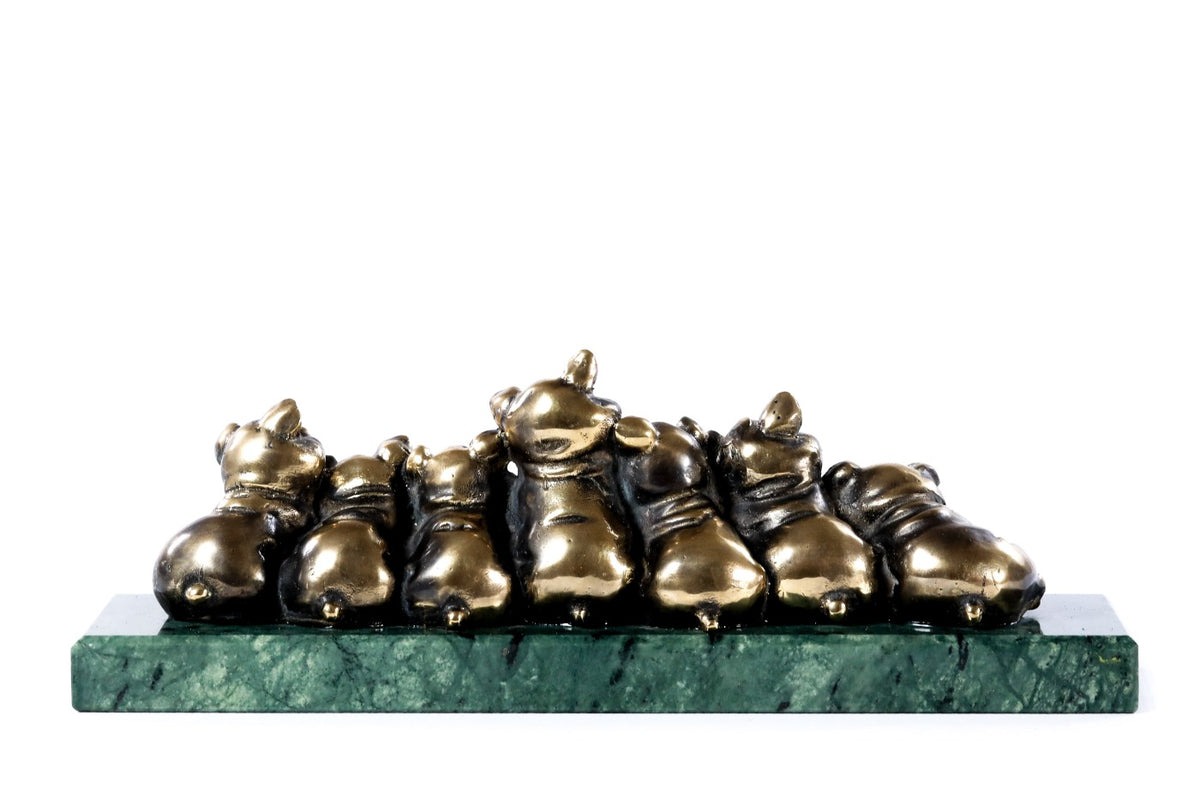 Bronze piglets sculpture — detail view