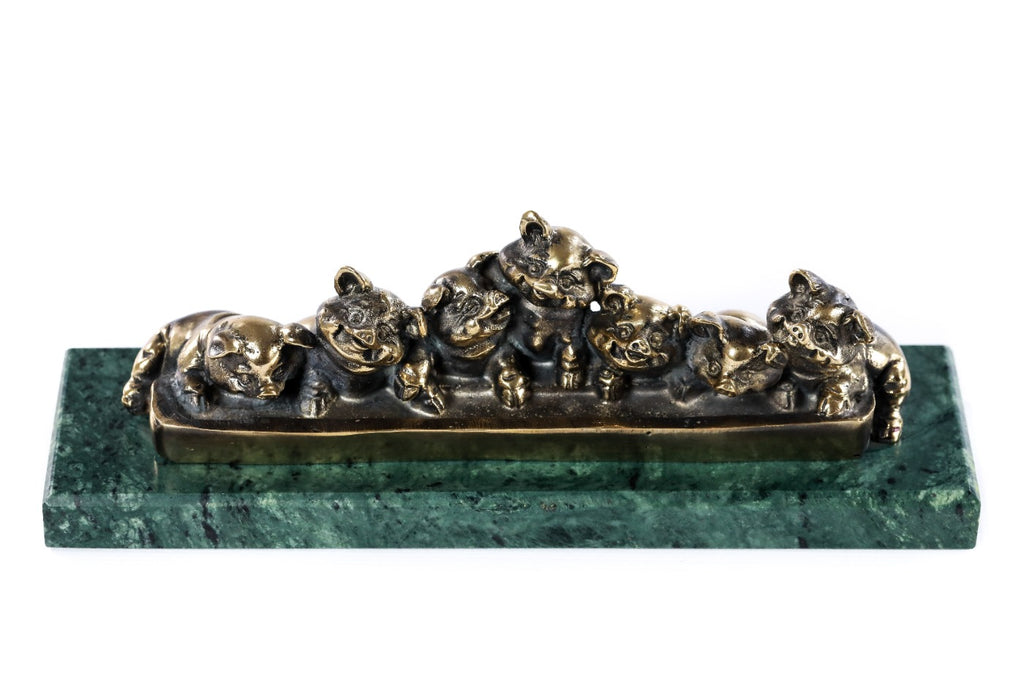 Bronze piglets sculpture — back view