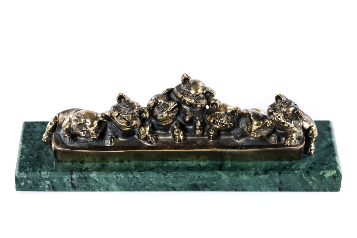 Bronze piglets sculpture — back view