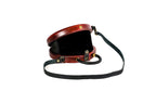 Cherry red wooden bag with leather strap — side view