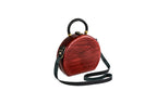 Handmade wooden handbag — braided handle close-up