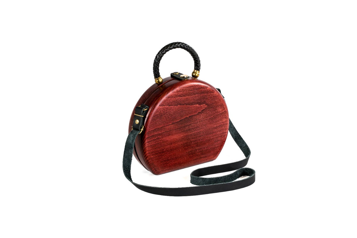 Handmade wooden handbag — braided handle close-up