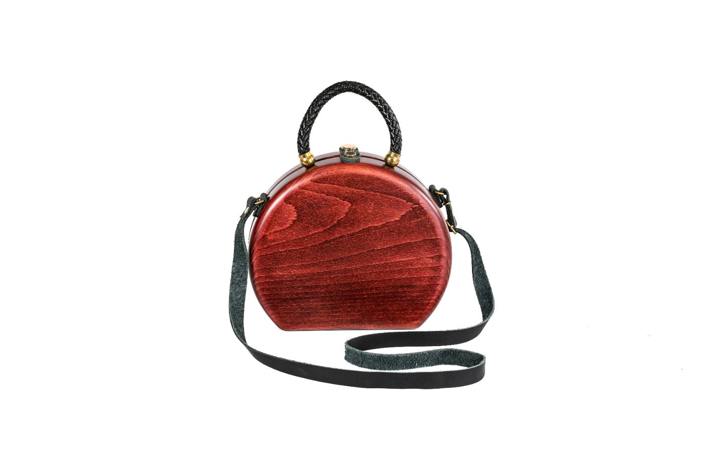 Round wooden handbag in cherry red — detail view