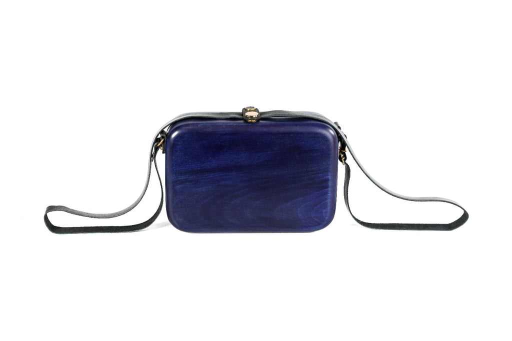 Rectangular wooden handbag in indigo blue — detail view