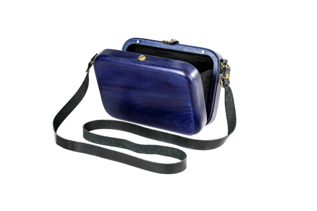 Rectangular wooden bag in indigo blue — angle view