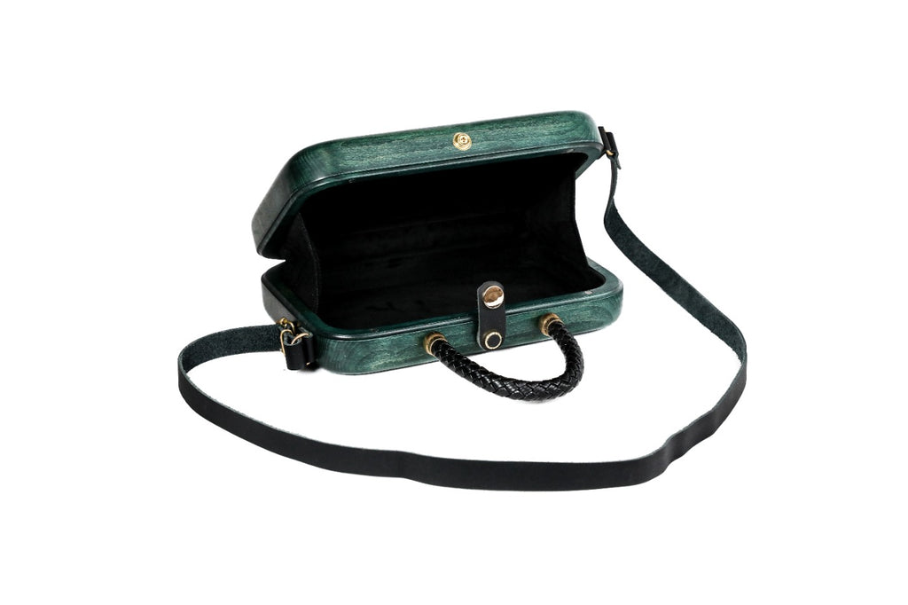 Rectangular wooden handbag in malachite green — detail view
