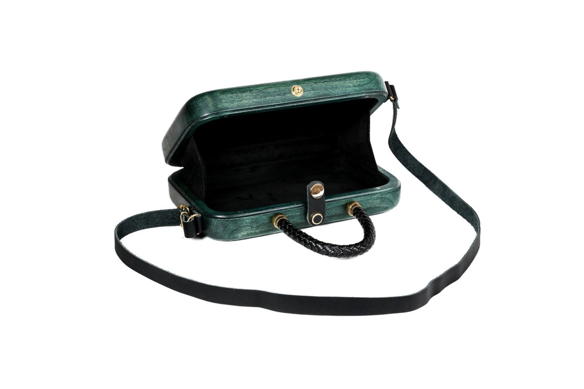 Rectangular wooden handbag in malachite green — detail view