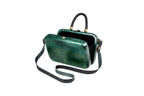 Rectangular wooden bag in malachite green — angle view