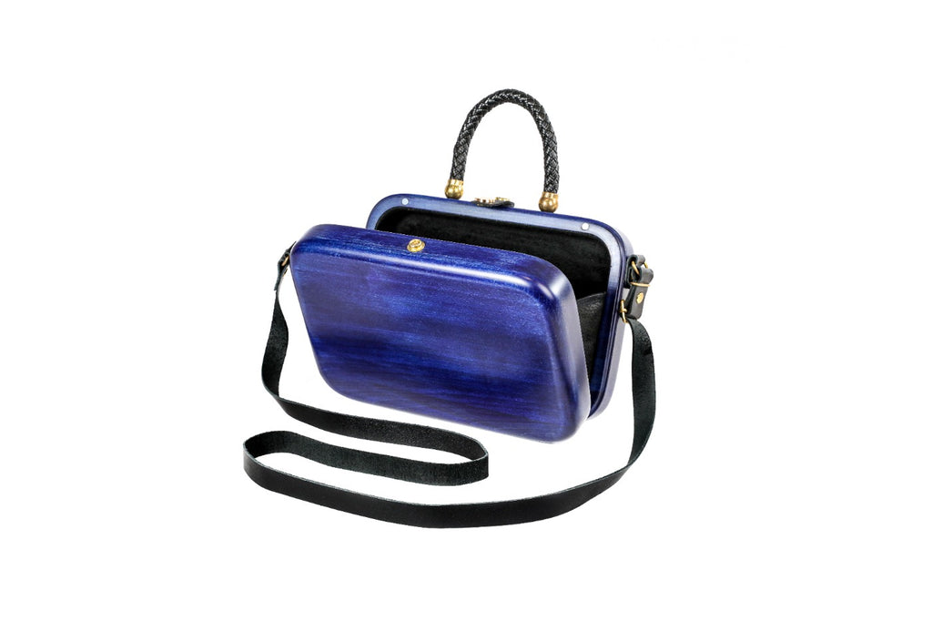 Rectangular wooden bag in sapphire blue — angle view