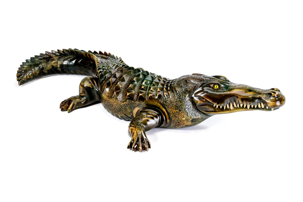 Handmade wooden crocodile sculpture — carving detail