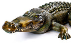 Wooden crocodile sculpture hand carved from linden wood — detail view