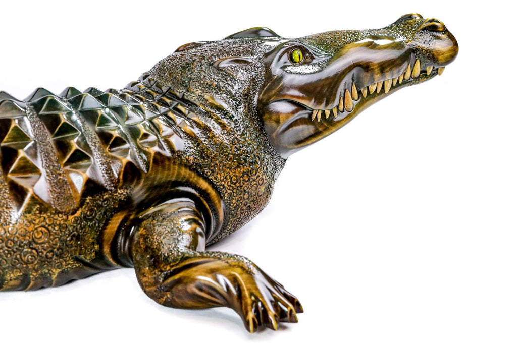 Wooden crocodile sculpture — close-up