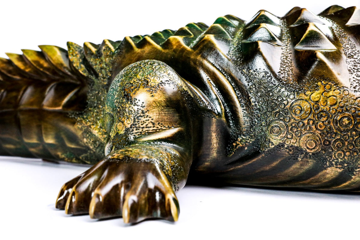 Crocodile wooden sculpture — back view