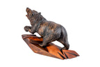 Hand-carved bear sculpture — reverse side view