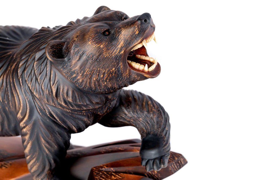 Wooden bear sculpture — close-up