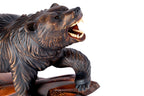 Wooden bear sculpture — close-up
