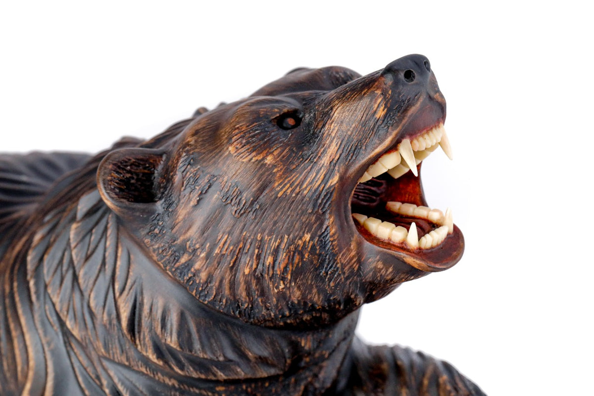 Walnut bear sculpture hand carved — detail view
