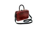 Handmade wooden handbag — braided handle close-up