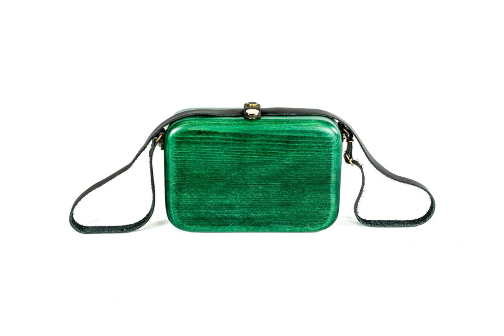 Emerald green wooden bag with leather strap — side view