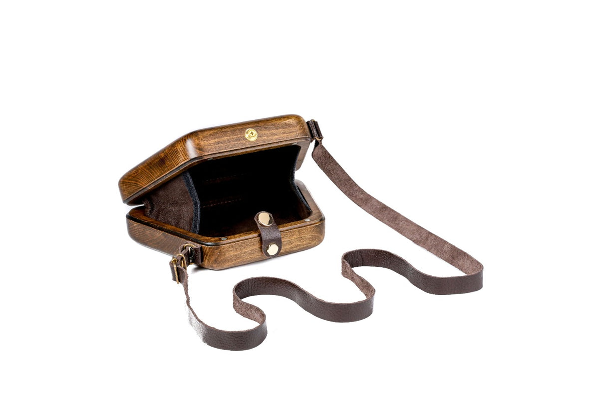 Trapezoid wooden handbag in brown — detail view