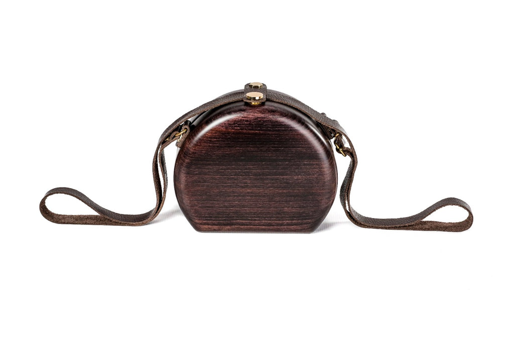 Round wooden handbag in espresso brown — detail view