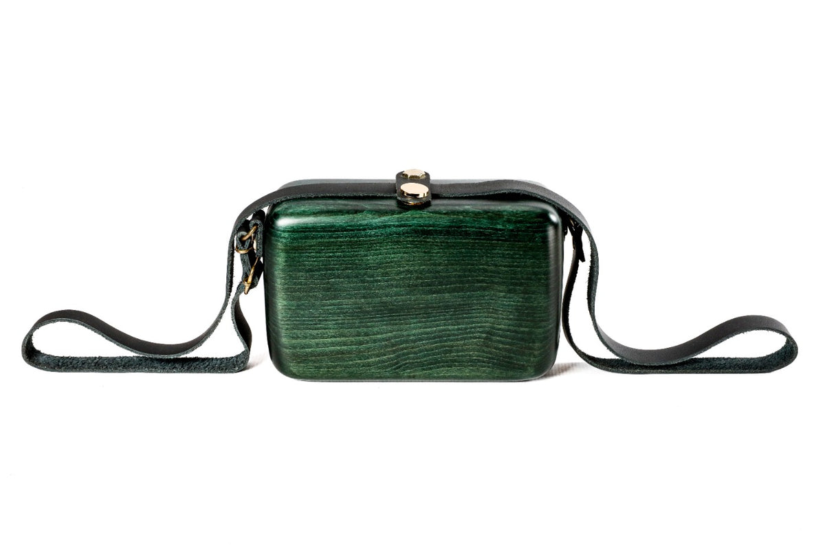 Rectangular wooden handbag in bottle green — detail view