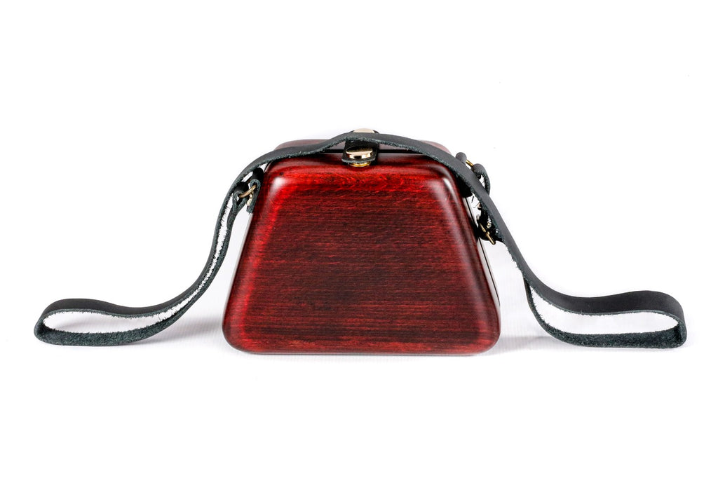 Trapezoid wooden handbag in ruby red — detail view