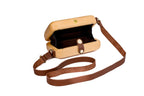 Rectangular wooden bag with engraved ornament — angle view