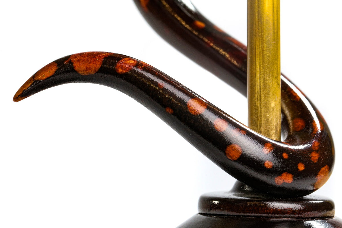 Wooden medical logo sculpture, natural linden grain detail