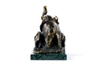 Handmade bronze elephant figurine with calves — close-up