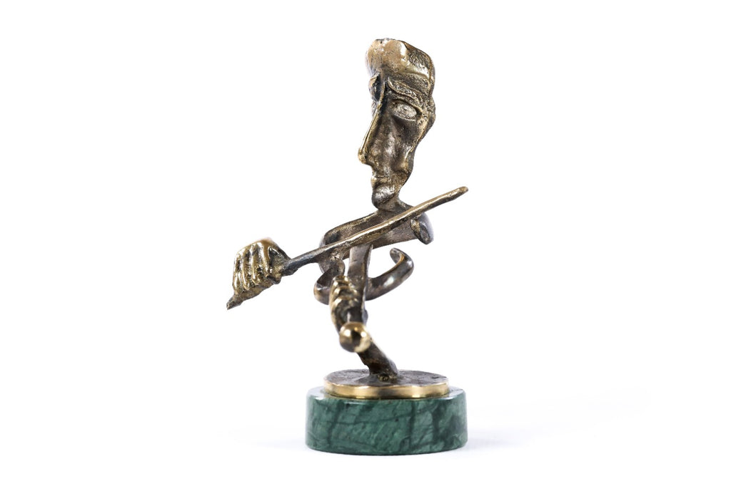 Bronze violinist sculpture — back view