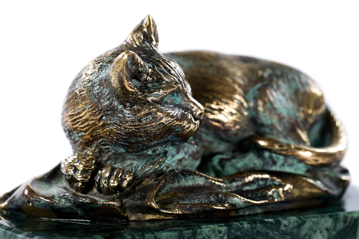 Bronze cat sculpture — side view