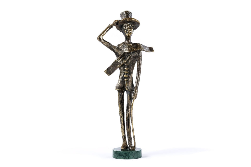 Handmade bronze boy figurine — close-up