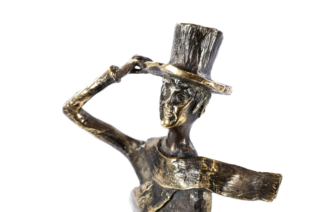 Bronze Boy with a Cane sculpture — back view