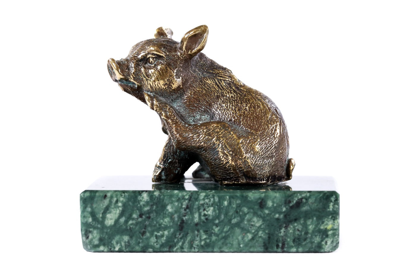 Bronze piglet sculpture — back view